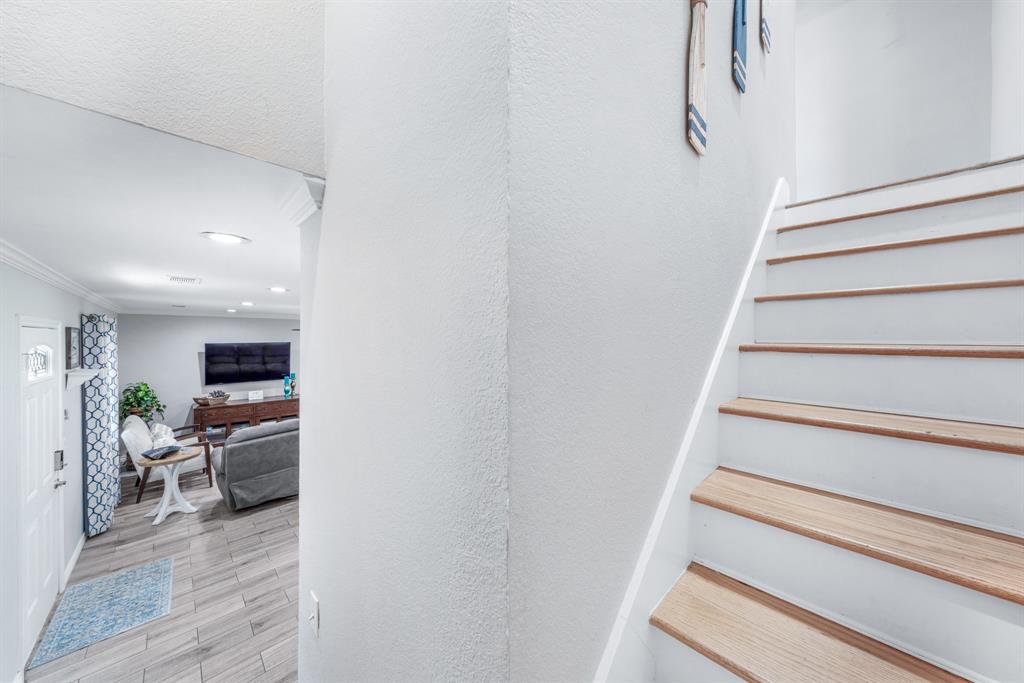 154 Wapiti Quitman, TX 75783 - Photo 20 of 31 a view of entryway and hall with wooden floor