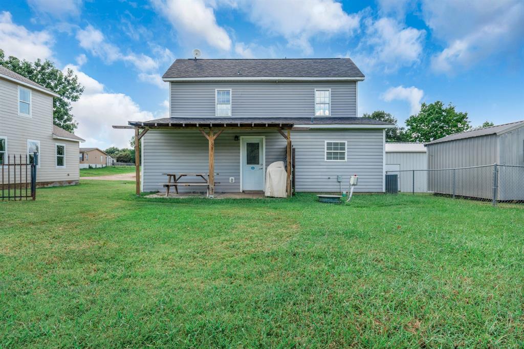 154 Wapiti Quitman, TX 75783 - Photo 28 of 31 a front view of a house with garden