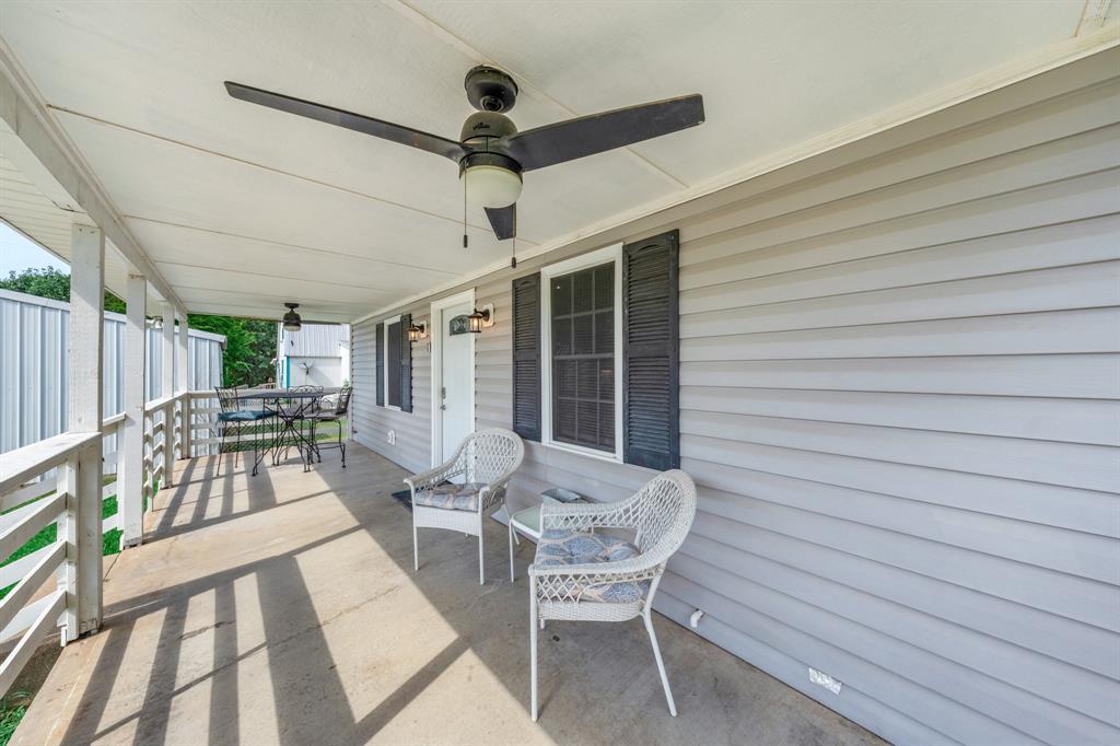 154 Wapiti Quitman, TX 75783 - Photo 6 of 31 a view of a patio with a table and chairs