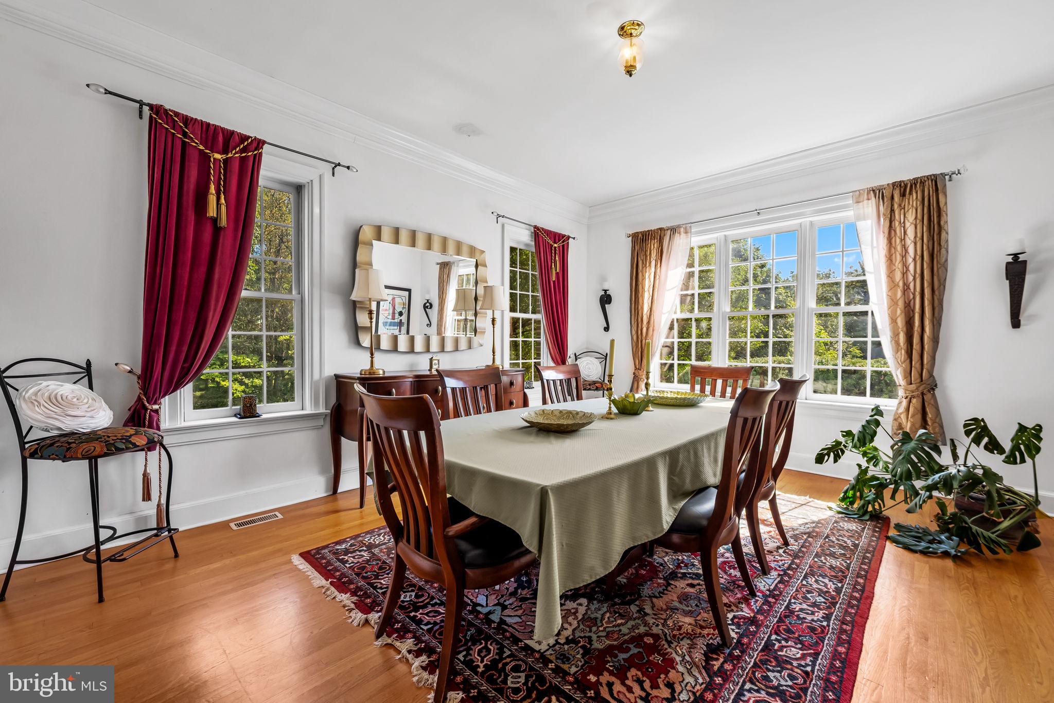 660 Greenbridge Road Brookeville, MD 20833 - Photo 11 of 56 a view of a dining room with furniture window and wooden floor