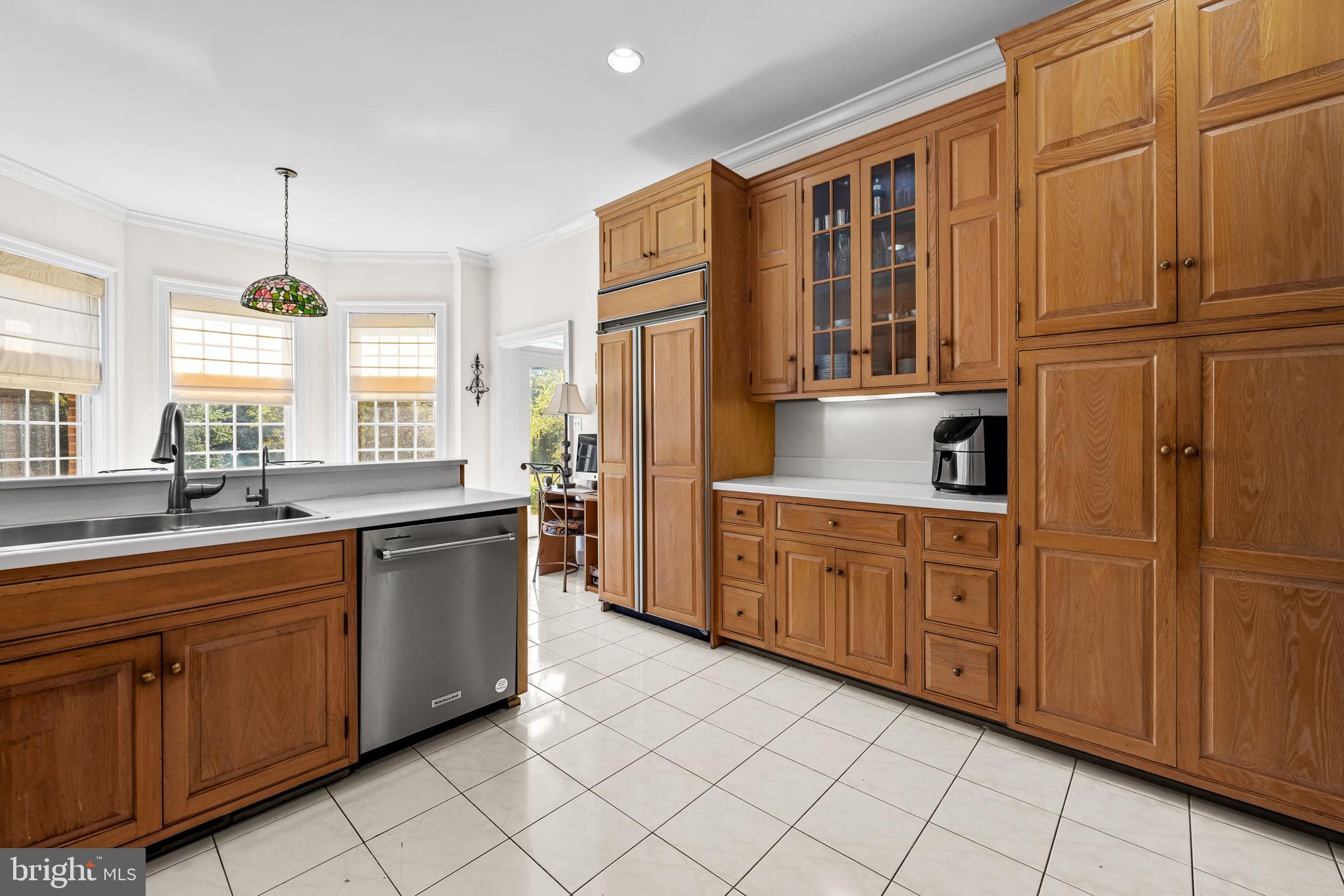 660 Greenbridge Road Brookeville, MD 20833 - Photo 16 of 56 a large kitchen with stainless steel appliances granite countertop a sink and cabinets