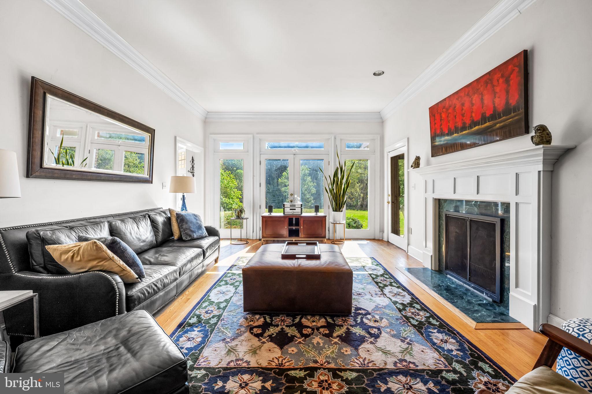 660 Greenbridge Road Brookeville, MD 20833 - Photo 18 of 56 a living room with furniture and a fireplace