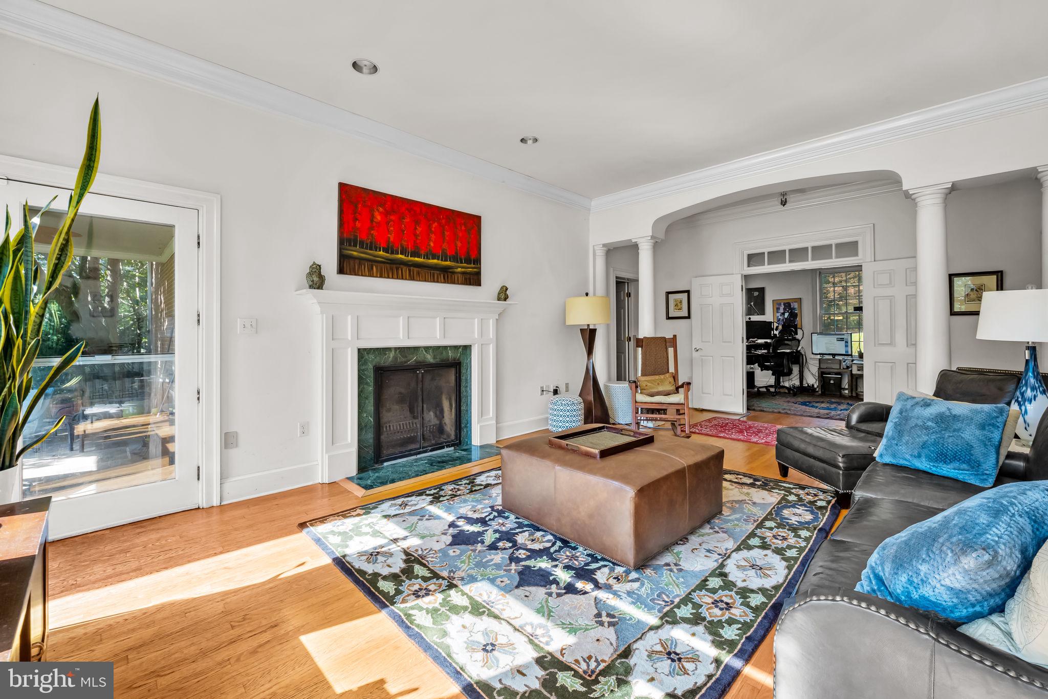 660 Greenbridge Road Brookeville, MD 20833 - Photo 19 of 56 a living room with furniture and a fireplace