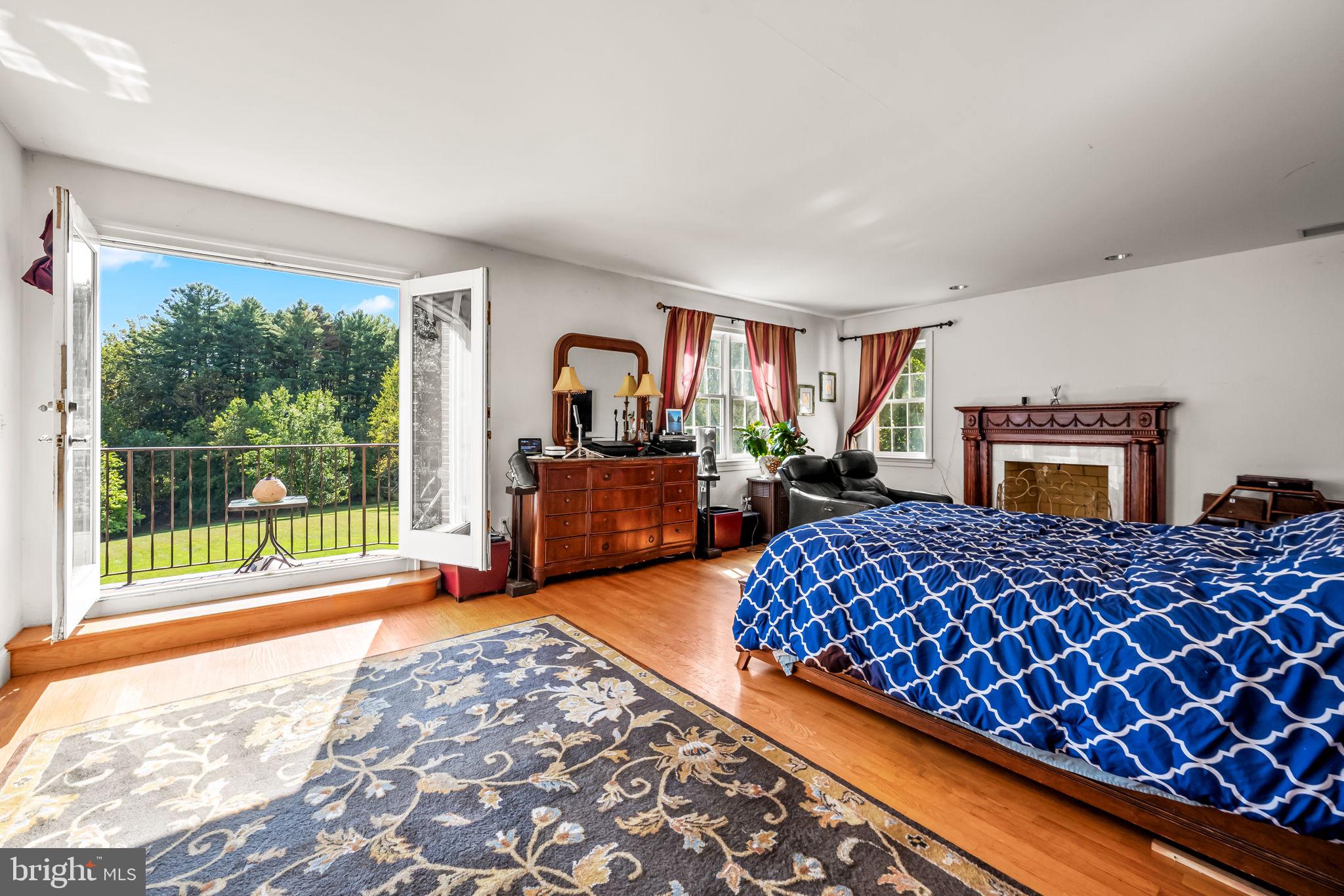 660 Greenbridge Road Brookeville, MD 20833 - Photo 22 of 56 a bed room with a bed and a couch