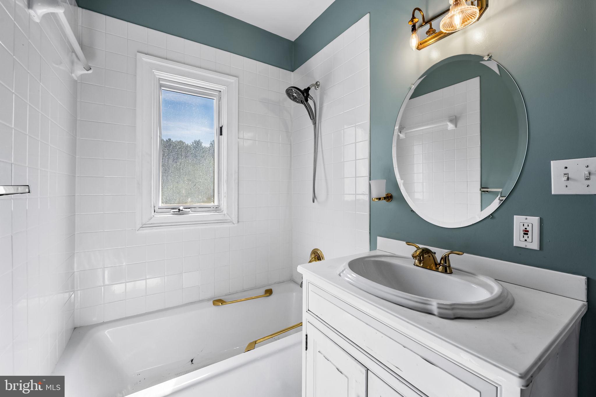 660 Greenbridge Road Brookeville, MD 20833 - Photo 31 of 56 a bathroom with a sink and a mirror