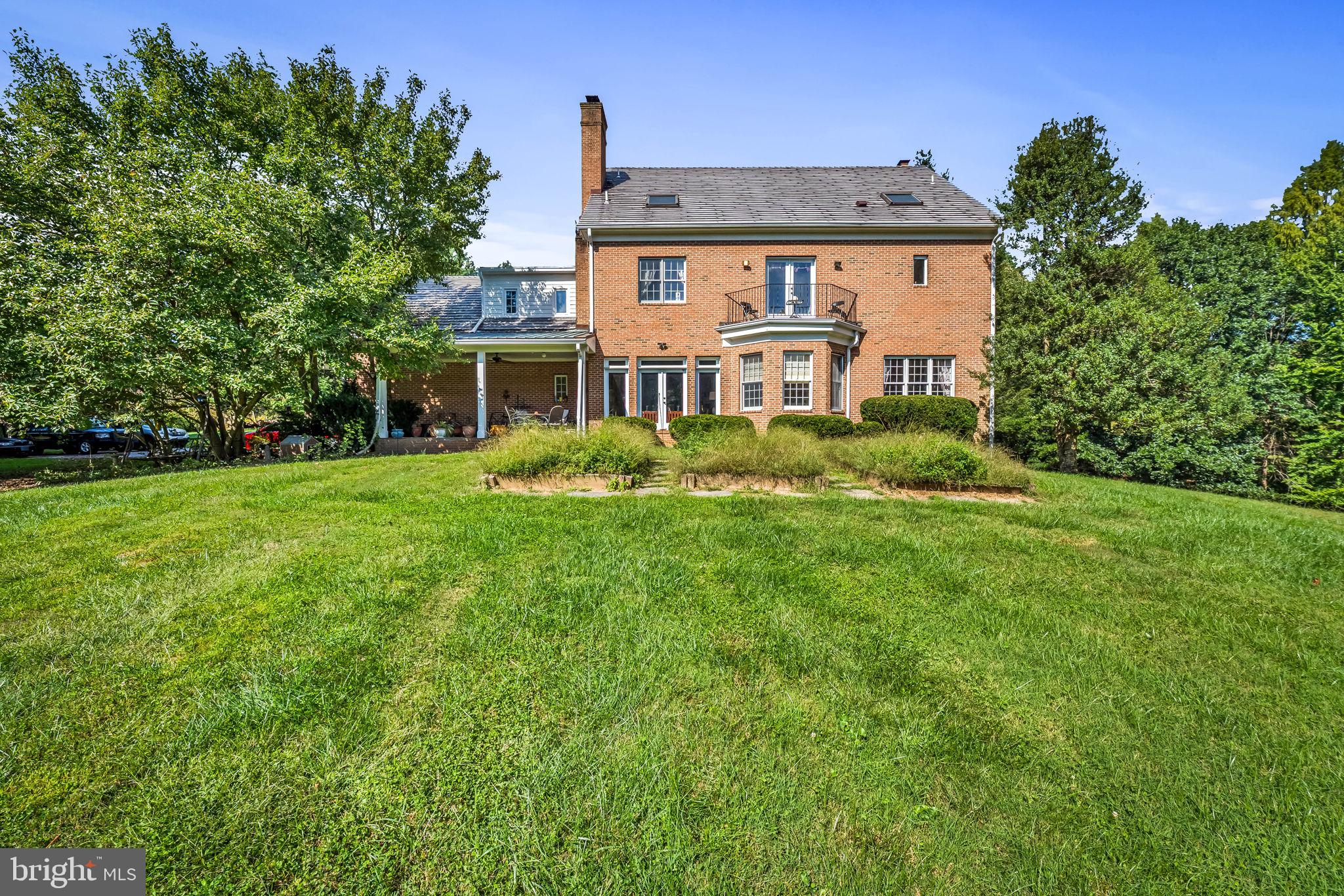 660 Greenbridge Road Brookeville, MD 20833 - Photo 33 of 56 a front view of a house with a garden