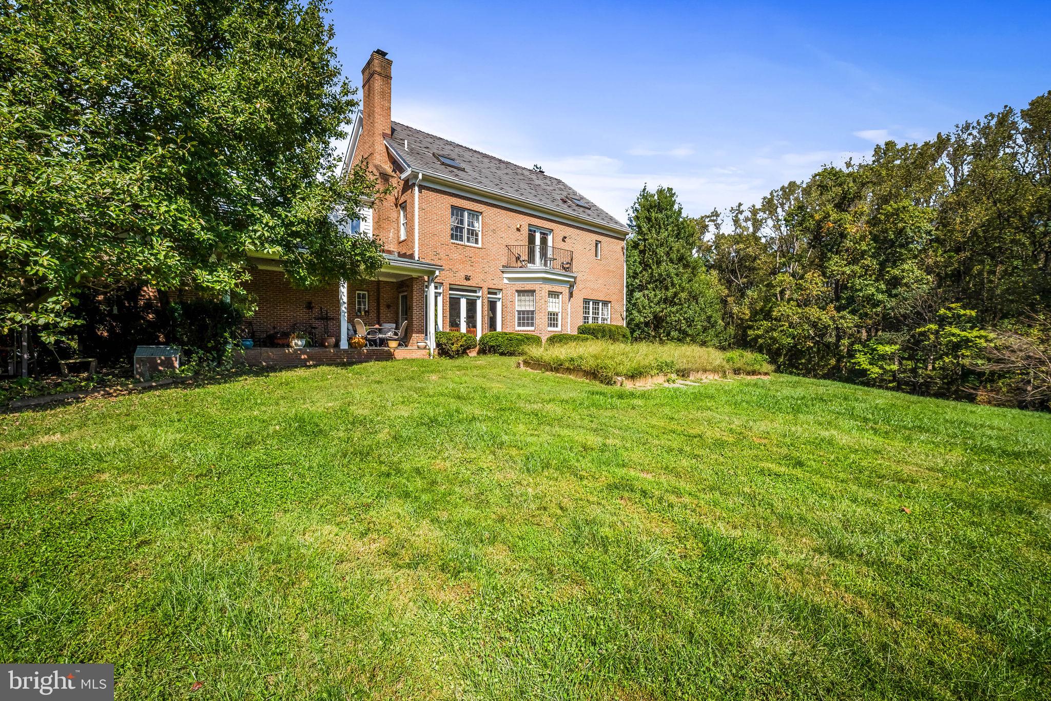 660 Greenbridge Road Brookeville, MD 20833 - Photo 34 of 56 a front view of a house with a yard and trees