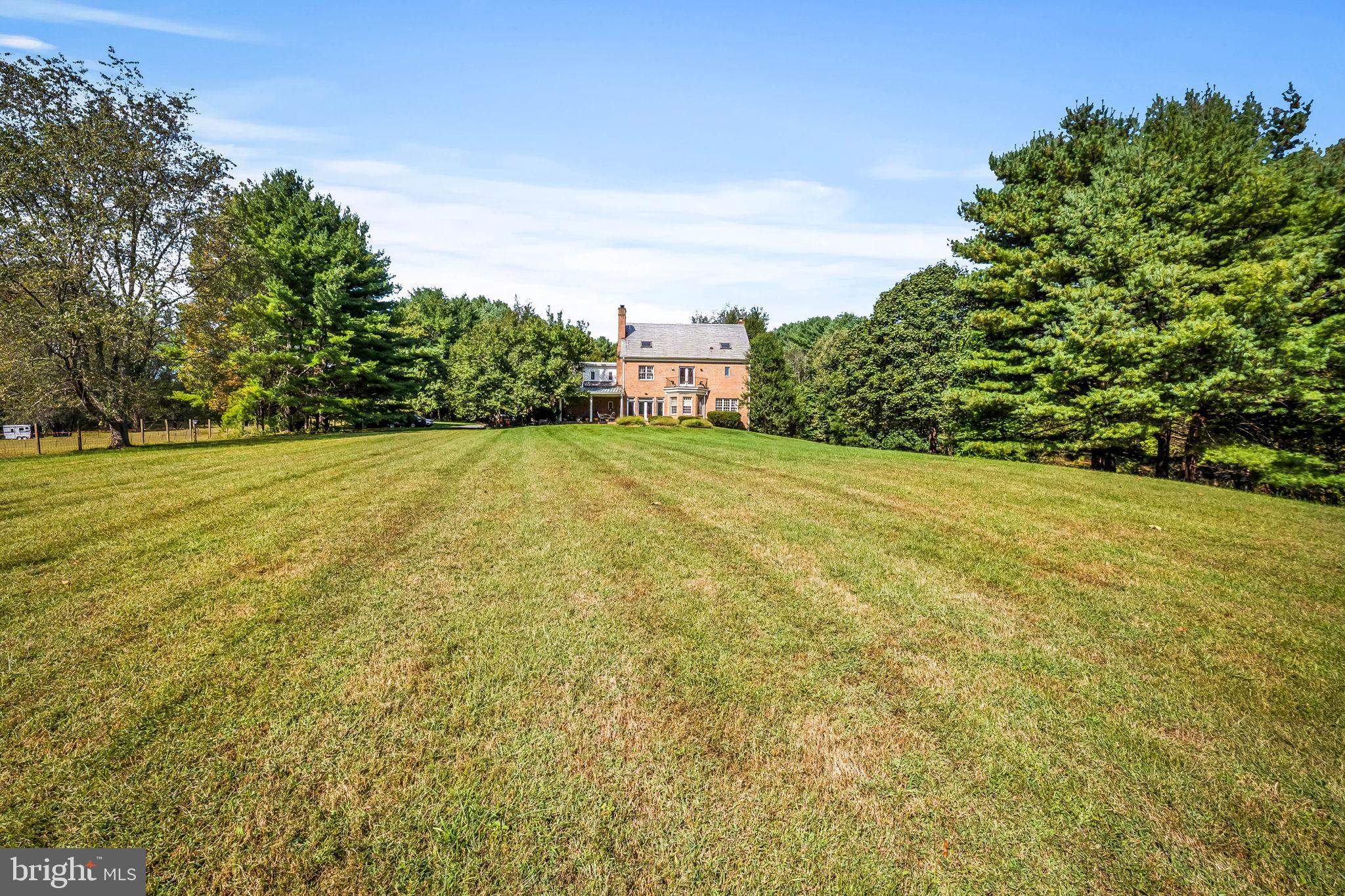 660 Greenbridge Road Brookeville, MD 20833 - Photo 35 of 56 a view of a big yard with large trees