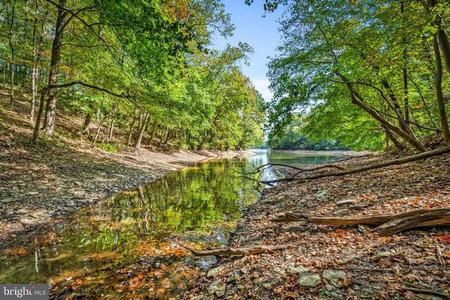 a view of a house with a big yard