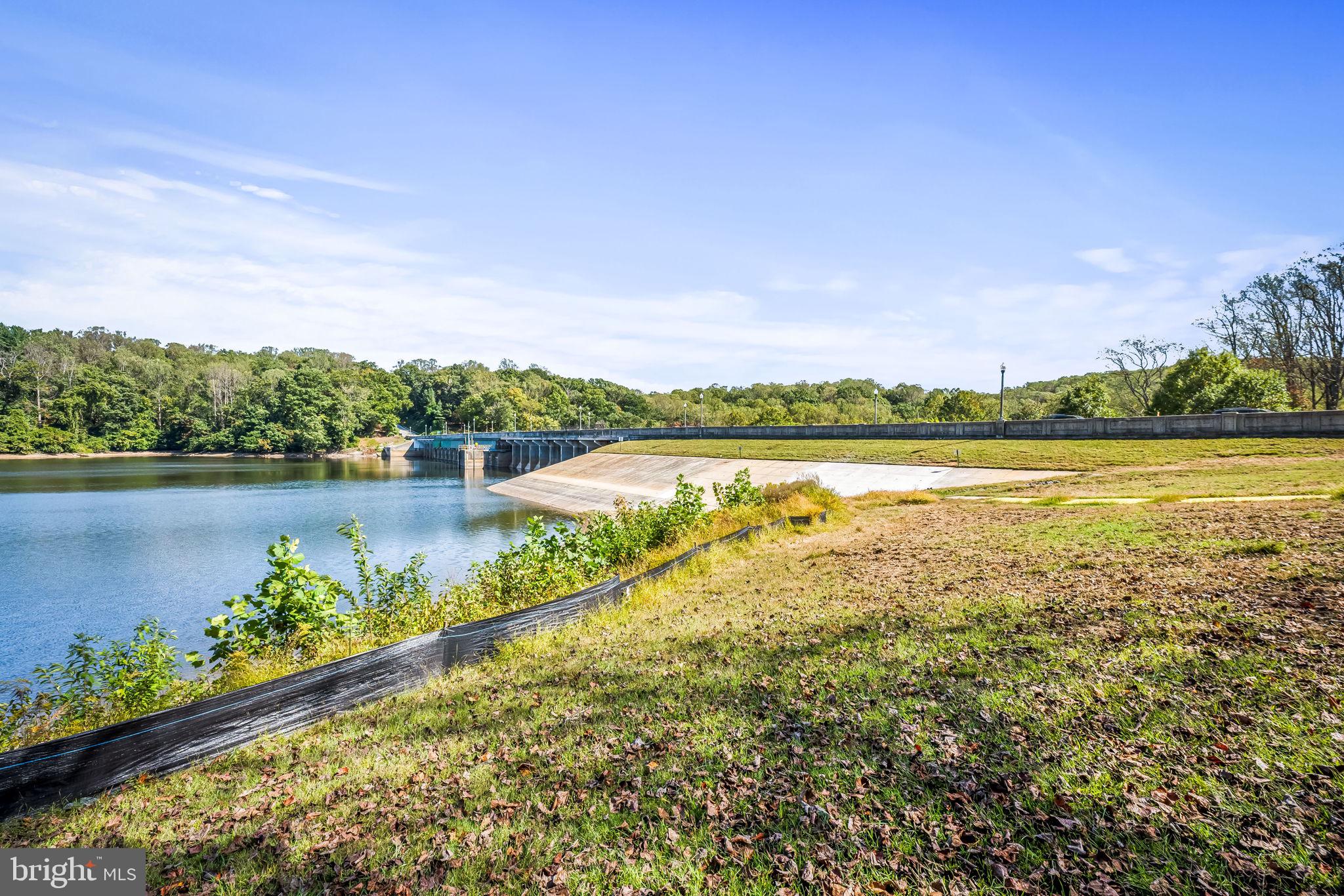 660 Greenbridge Road Brookeville, MD 20833 - Photo 52 of 56 a view of a lake with a city
