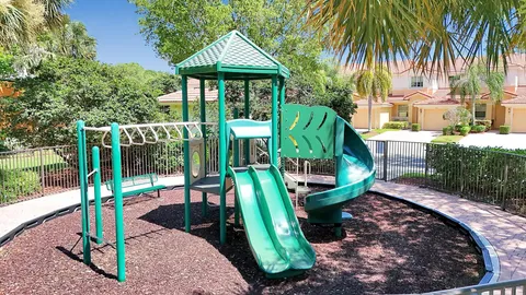 a view of a garden with a slide