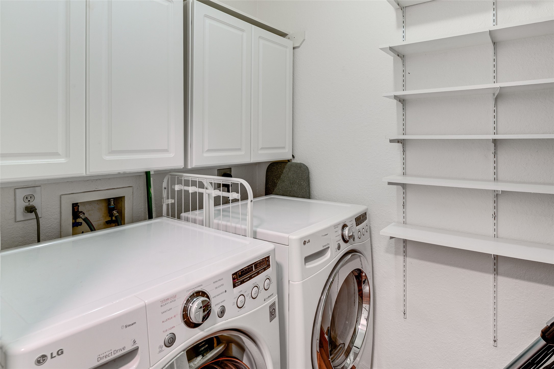 34 Steep Trail Place Conroe, TX 77385 - Photo 18 of 21 a utility room with dryer and washer