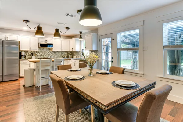 a view of a dining room with furniture