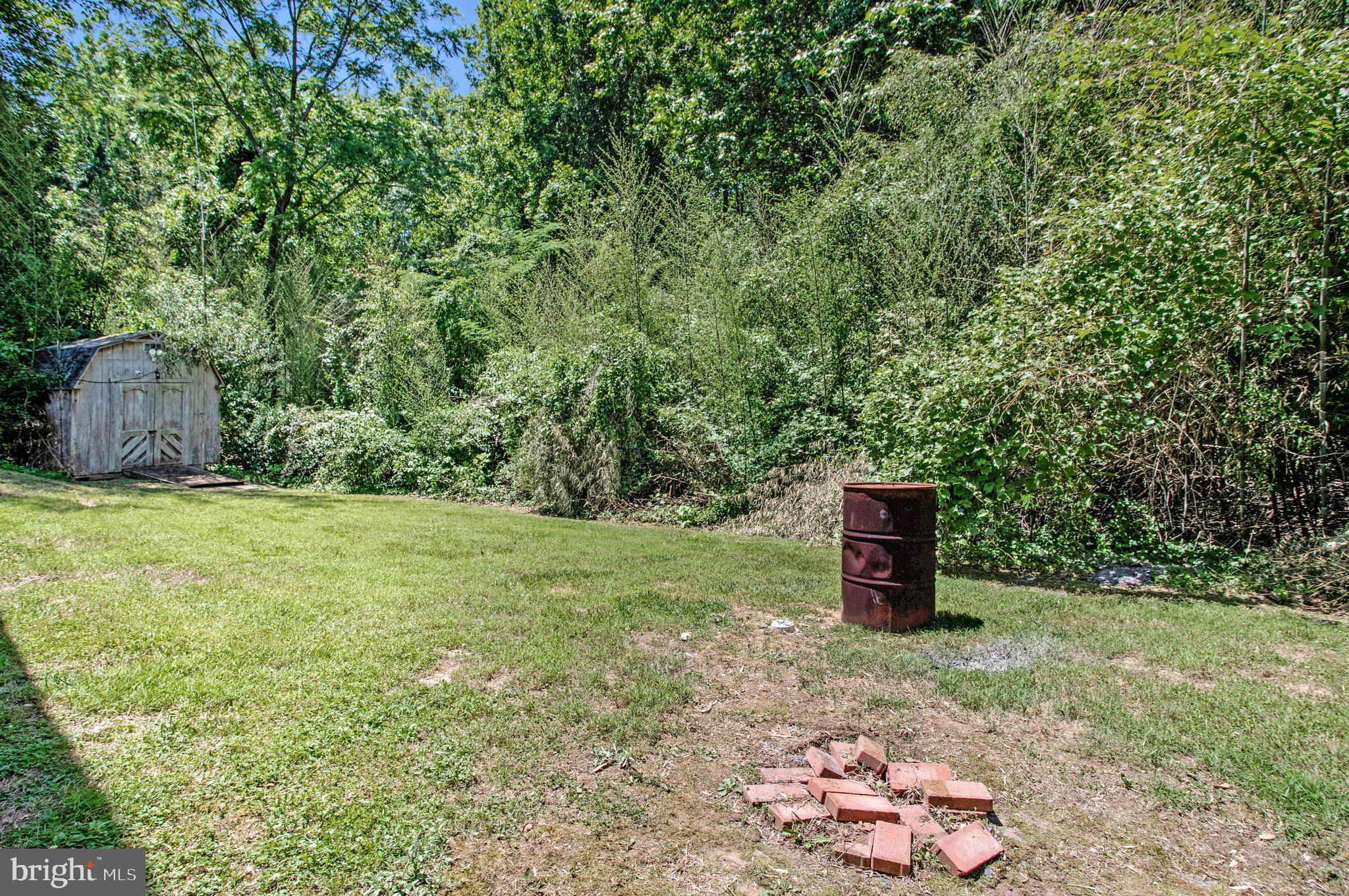 392 S Shore Prince Frederick, MD 20678 - Photo 30 of 30 Backyard that backs to trees