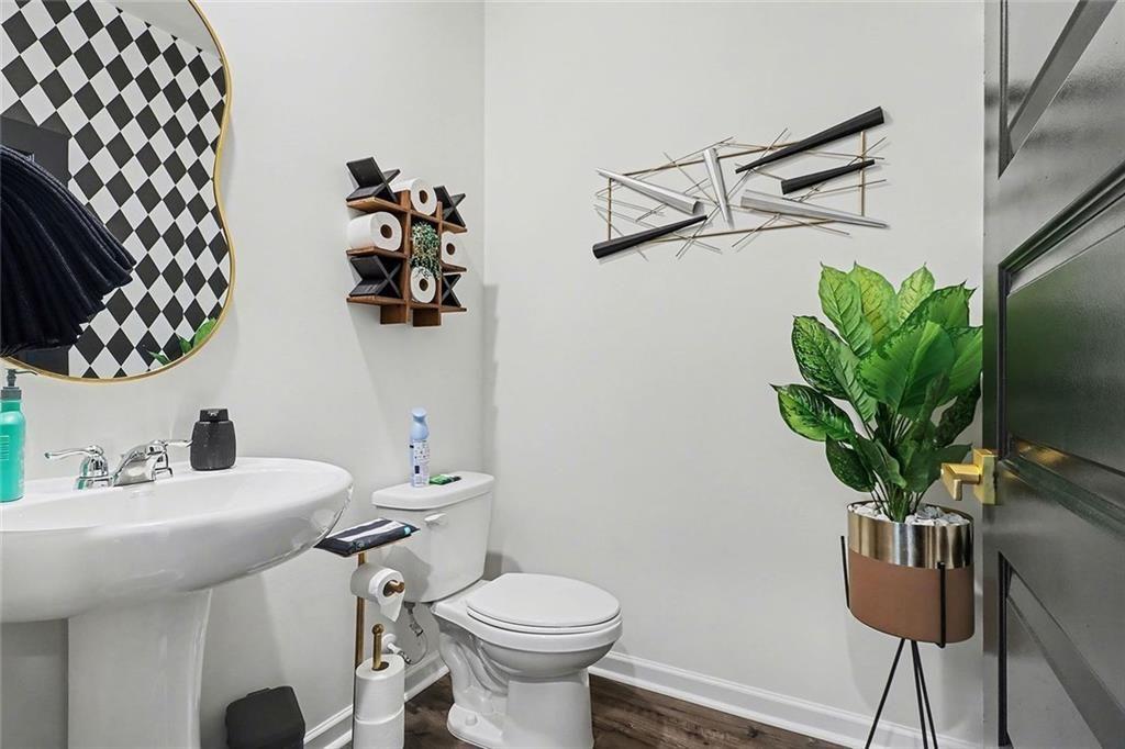 3732 Chevington Court Southeast Atlanta, GA 30354 - Photo 14 of 38 a bathroom with a sink toilet and a mirror
