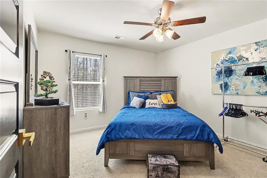 3732 Chevington Court Southeast Atlanta, GA 30354 - Photo 28 of 38 a bedroom with a bed and a window