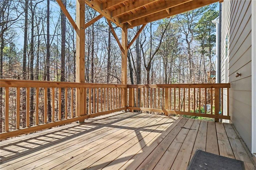 3732 Chevington Court Southeast Atlanta, GA 30354 - Photo 34 of 38 a front view of a house with a wooden floor