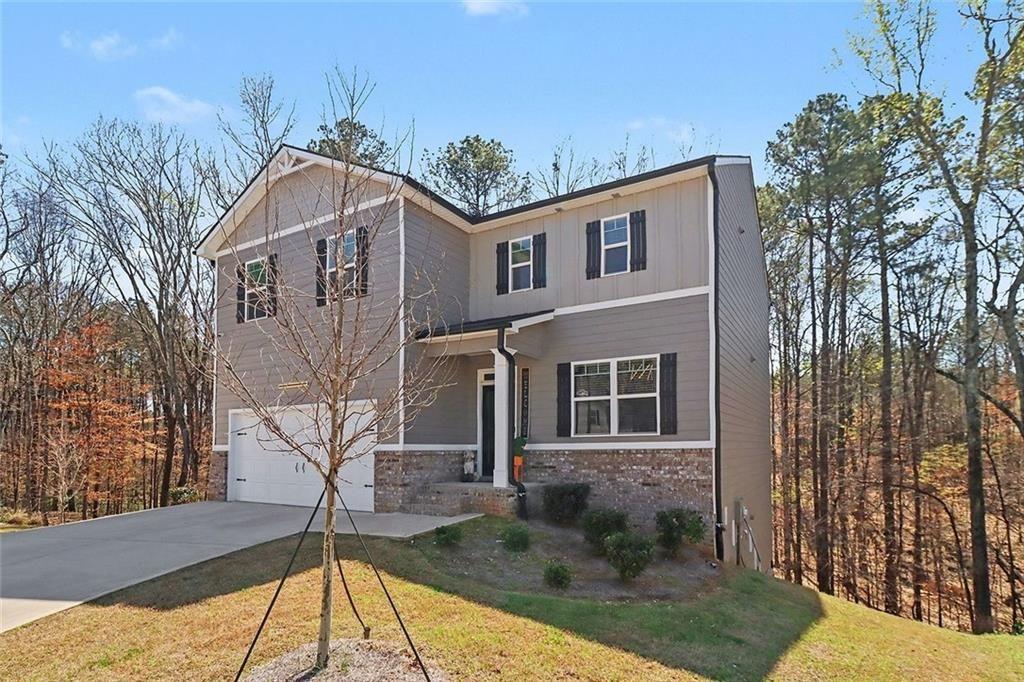 3732 Chevington Court Southeast Atlanta, GA 30354 - Photo 4 of 38 a front view of a house with a yard