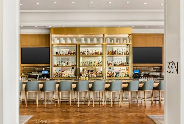 a view of a grassy field with trees