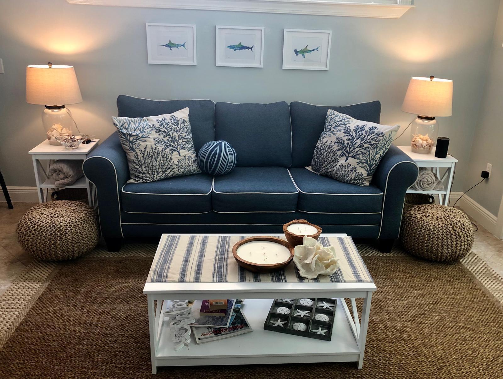 104 Anglers Way Islamorada, FL 33036 - Photo 12 of 18 a living room with furniture and a lamp