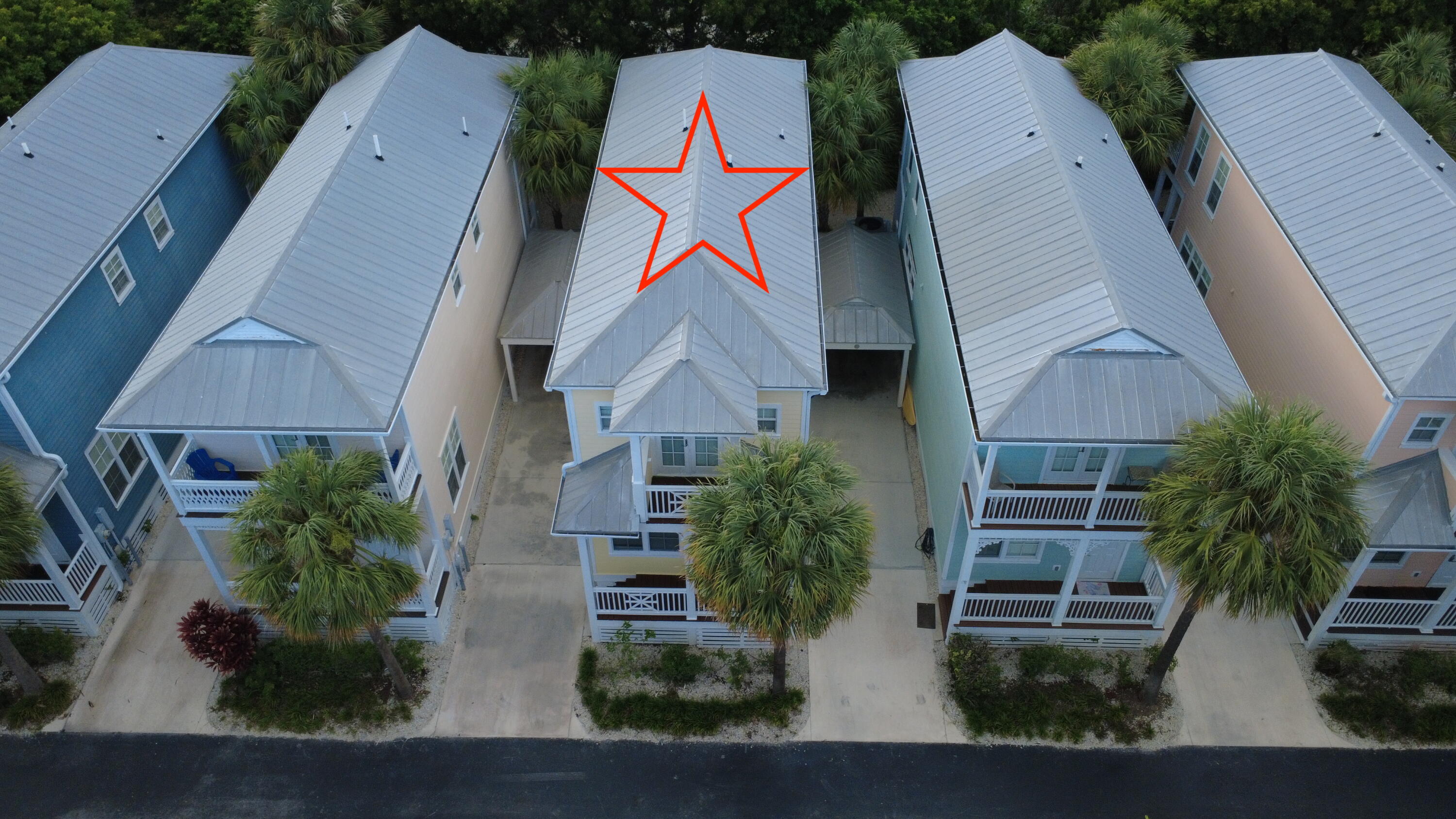 104 Anglers Way Islamorada, FL 33036 - Photo 2 of 18 an aerial view of multiple houses with a yard
