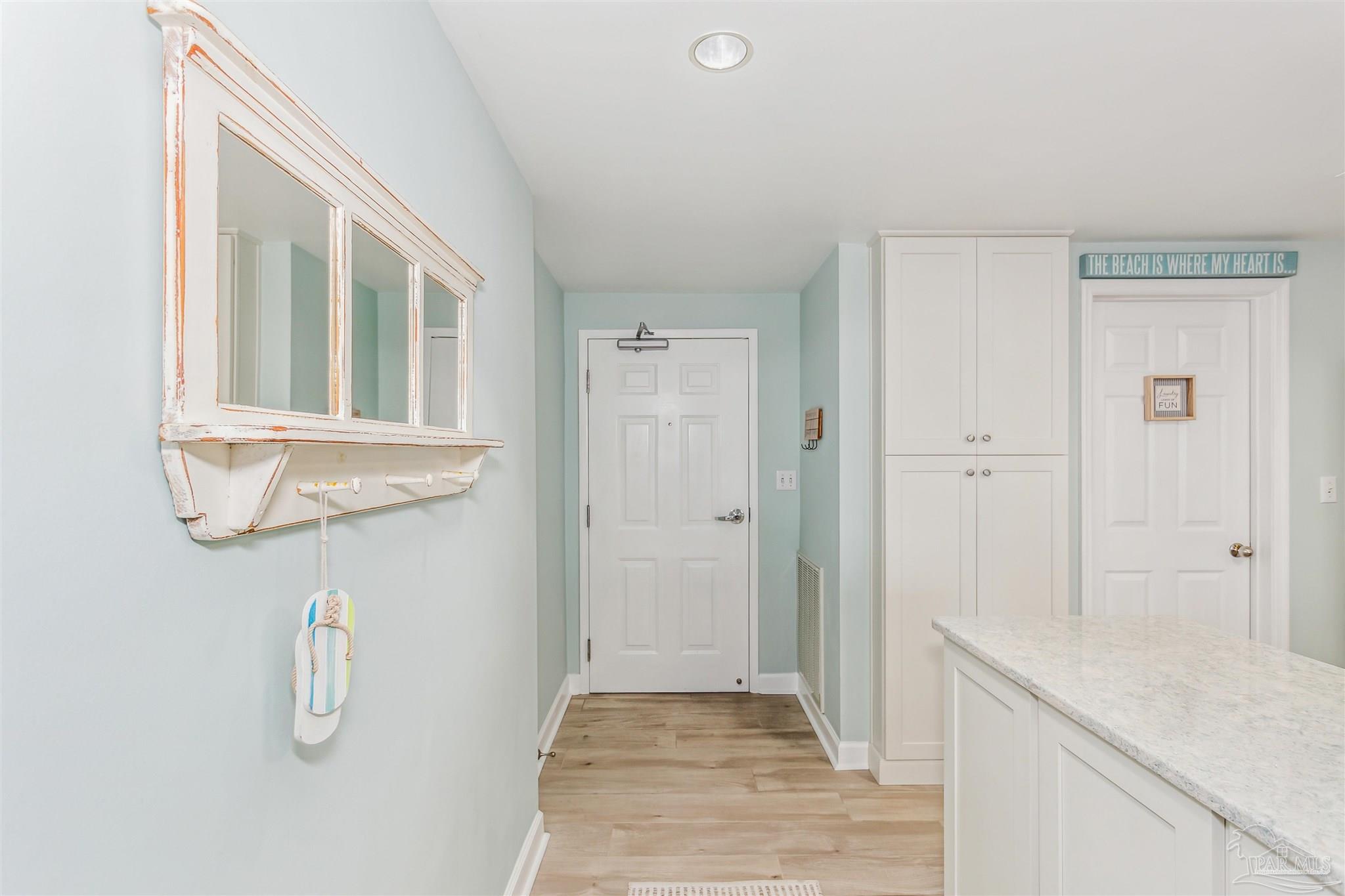 800 Fort Pickens Road, Unit 204 Pensacola Beach, FL 32561 - Photo 20 of 45 a bathroom with a granite countertop sink a toilet and shower