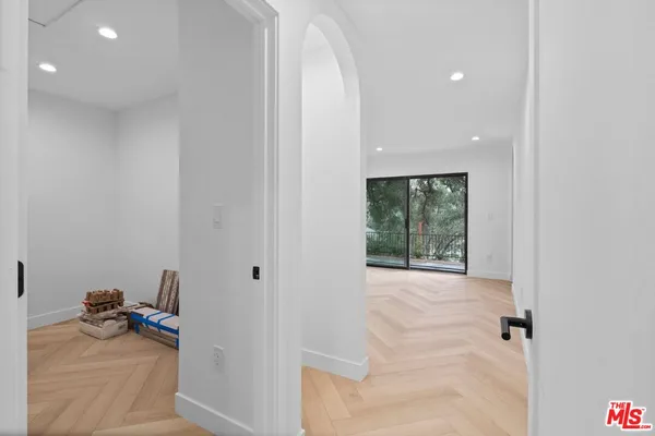 a view of a livingroom with couch and a window
