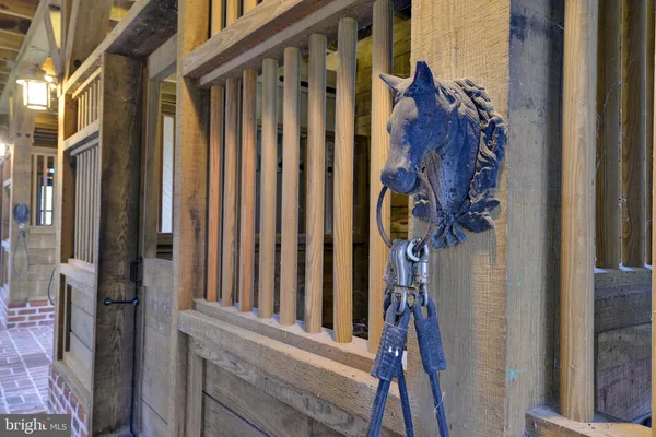 a living room filled with furniture and a chandelier