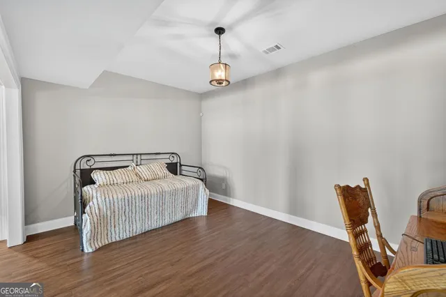 a backyard of a house with lots of green space