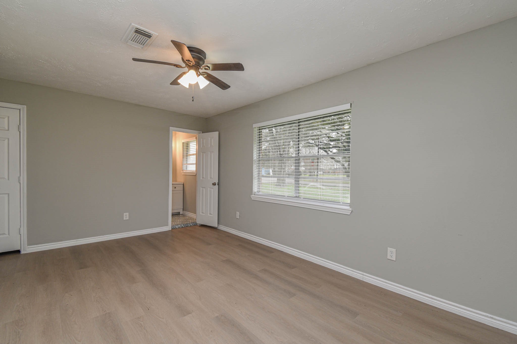 2834 Pansy Street Pasadena, TX 77503 - Photo 16 of 35 a view of an empty room with a window