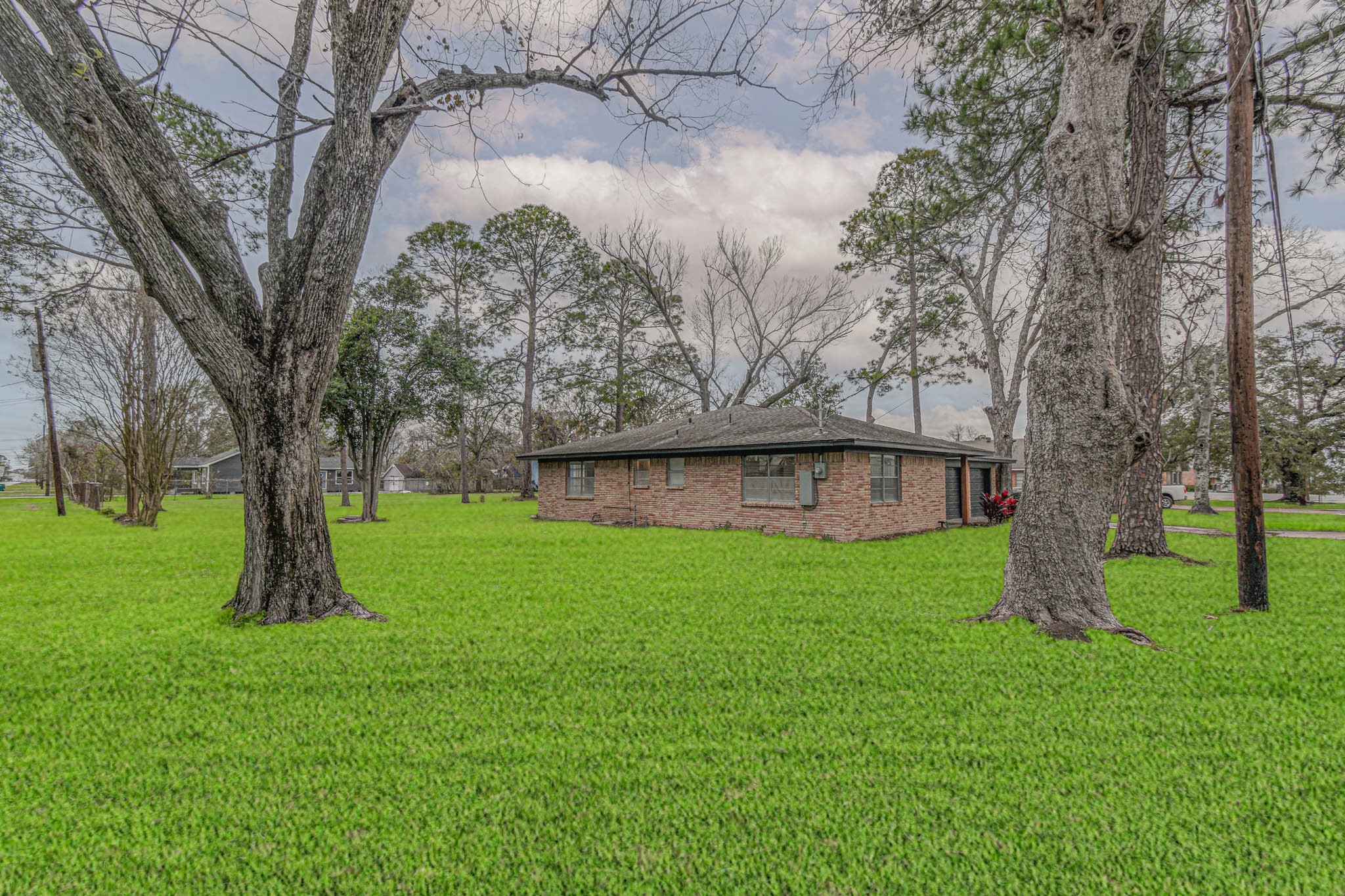 2834 Pansy Street Pasadena, TX 77503 - Photo 28 of 35 a view of a garden with a tree