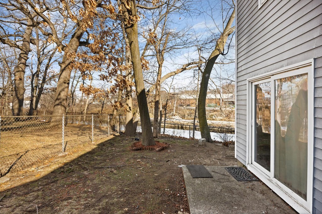 802 Lawrence Street, Unit D Lowell, MA 01852 - Photo 24 of 26 a view of outdoor space with deck