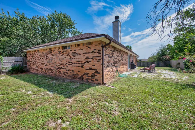 a view of a wooden fence