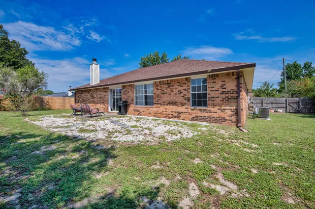 front view of a house with a big yard