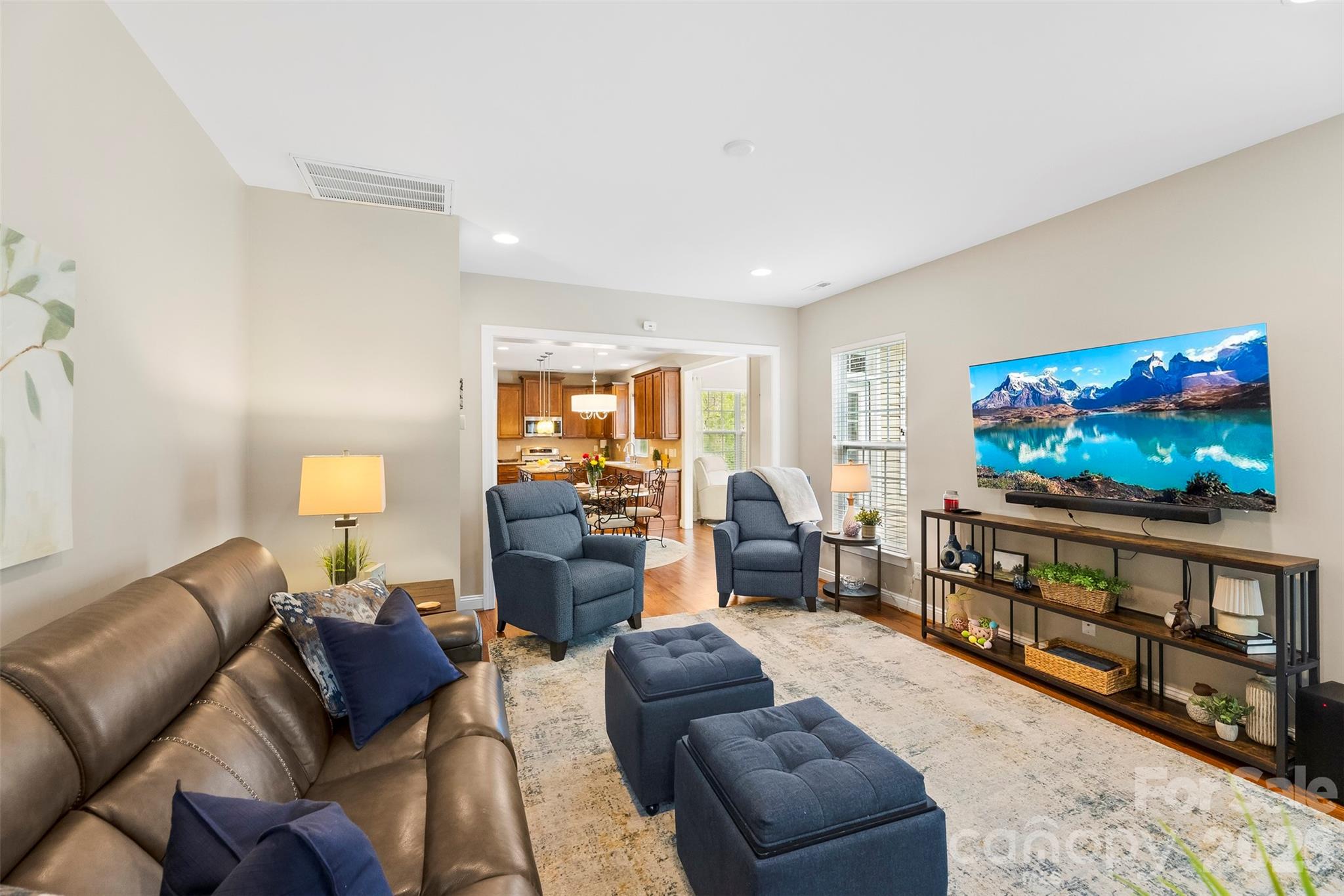 7574 Manakin Place Fort Mill, SC 29707 - Photo 16 of 40 a living room with furniture and a flat screen tv