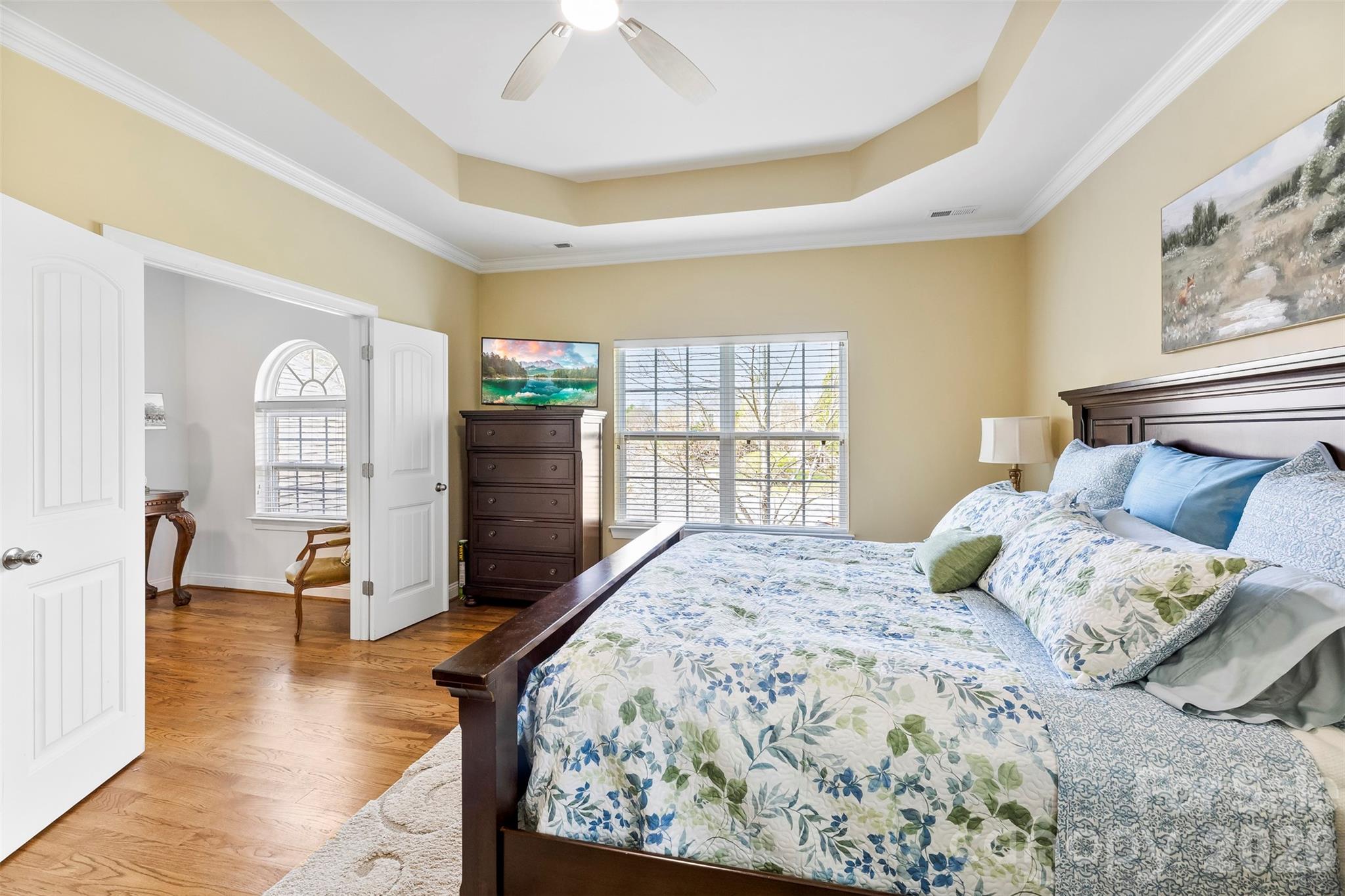 7574 Manakin Place Fort Mill, SC 29707 - Photo 18 of 40 a bedroom with a large bed and a window