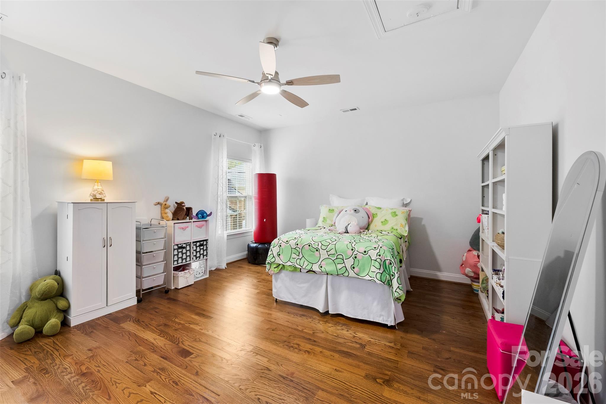 7574 Manakin Place Fort Mill, SC 29707 - Photo 21 of 40 a living room with furniture and a wooden floor