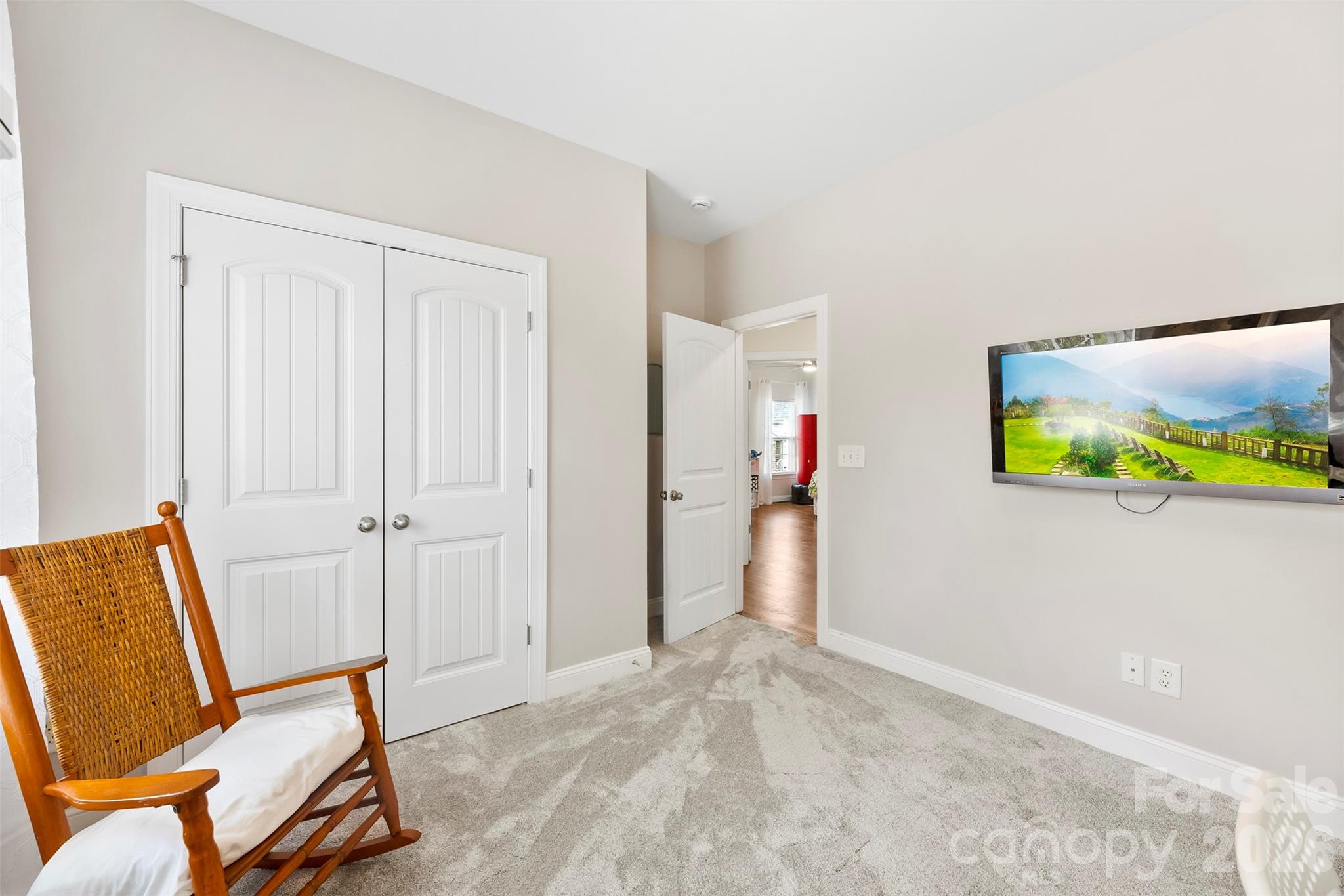 7574 Manakin Place Fort Mill, SC 29707 - Photo 26 of 40 a view of a hallway with workspace and painted walls
