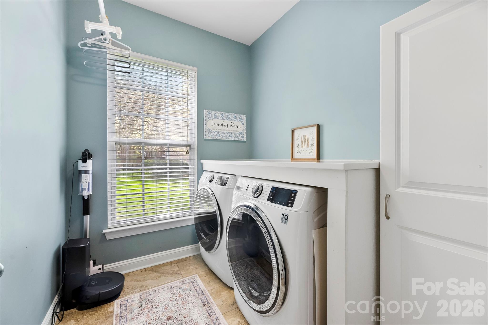 7574 Manakin Place Fort Mill, SC 29707 - Photo 28 of 40 a utility room with dryer and washer