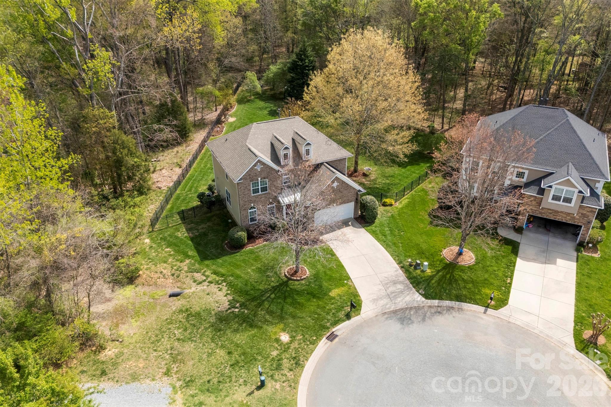 7574 Manakin Place Fort Mill, SC 29707 - Photo 36 of 40 a view of a garden with a large tree