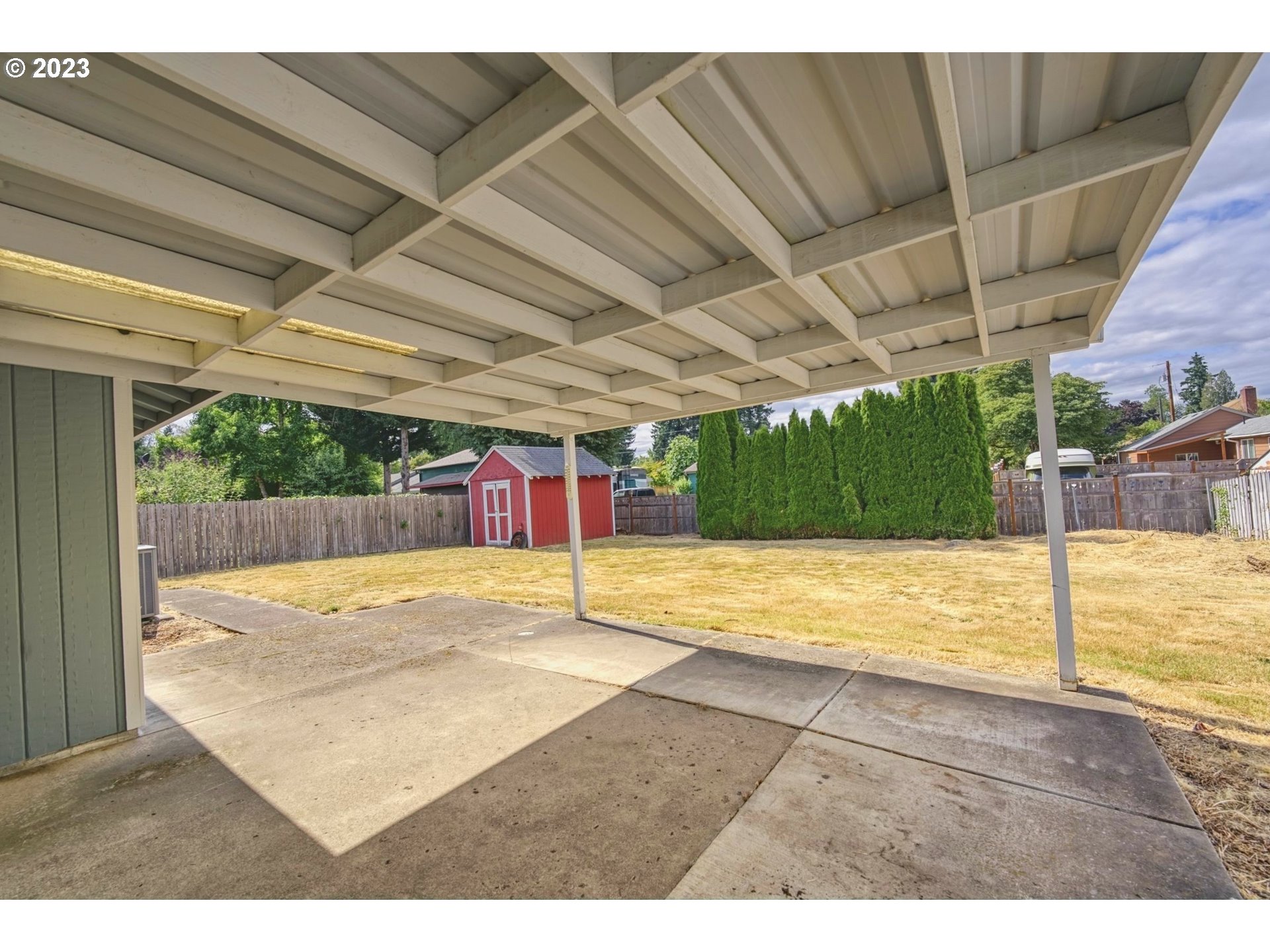 140 Southwest 8th Avenue Canby, OR 97013 - Photo 13 of 17 a view of a backyard of a house