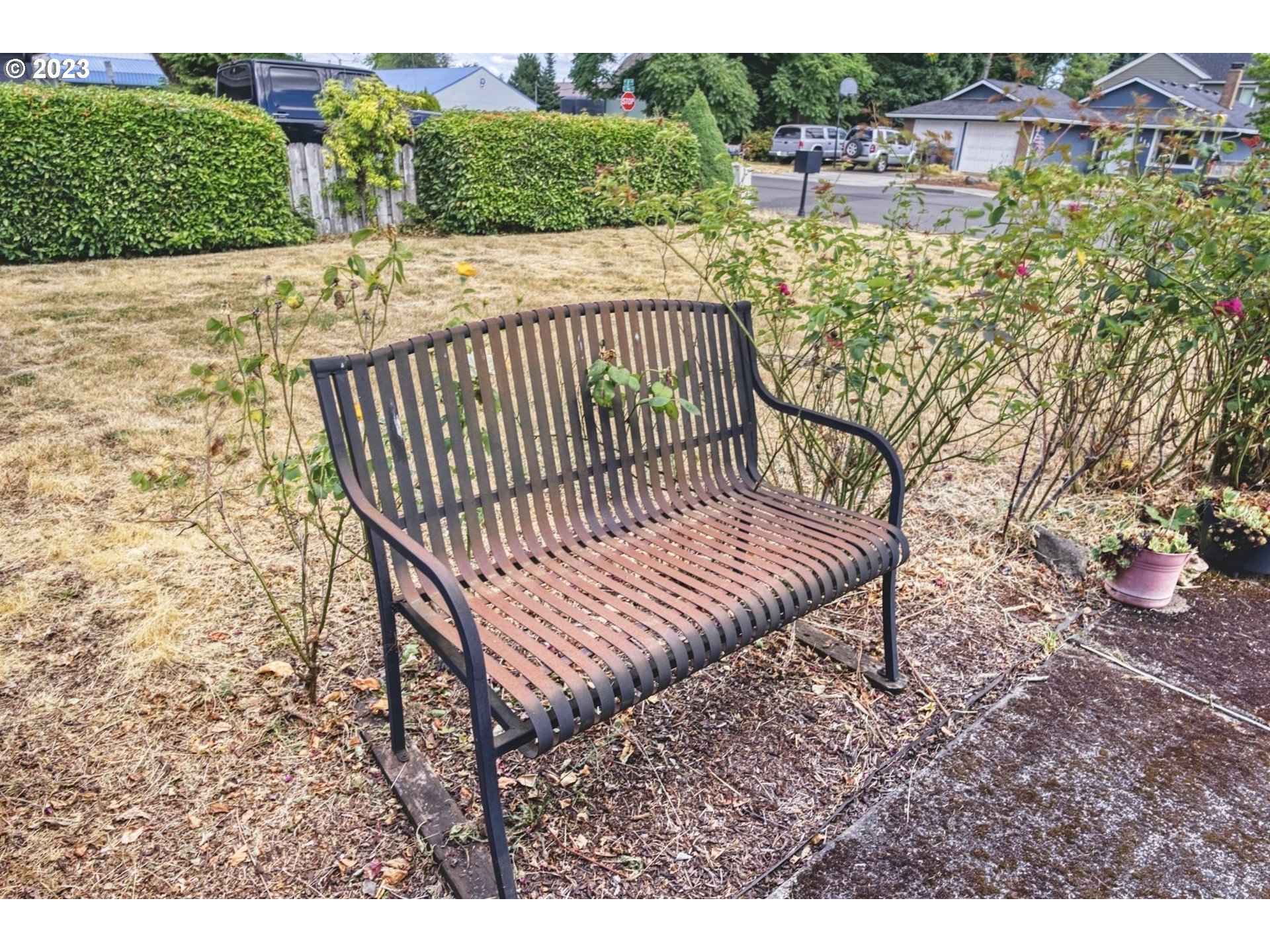 140 Southwest 8th Avenue Canby, OR 97013 - Photo 3 of 17 a view of a porch with a bench