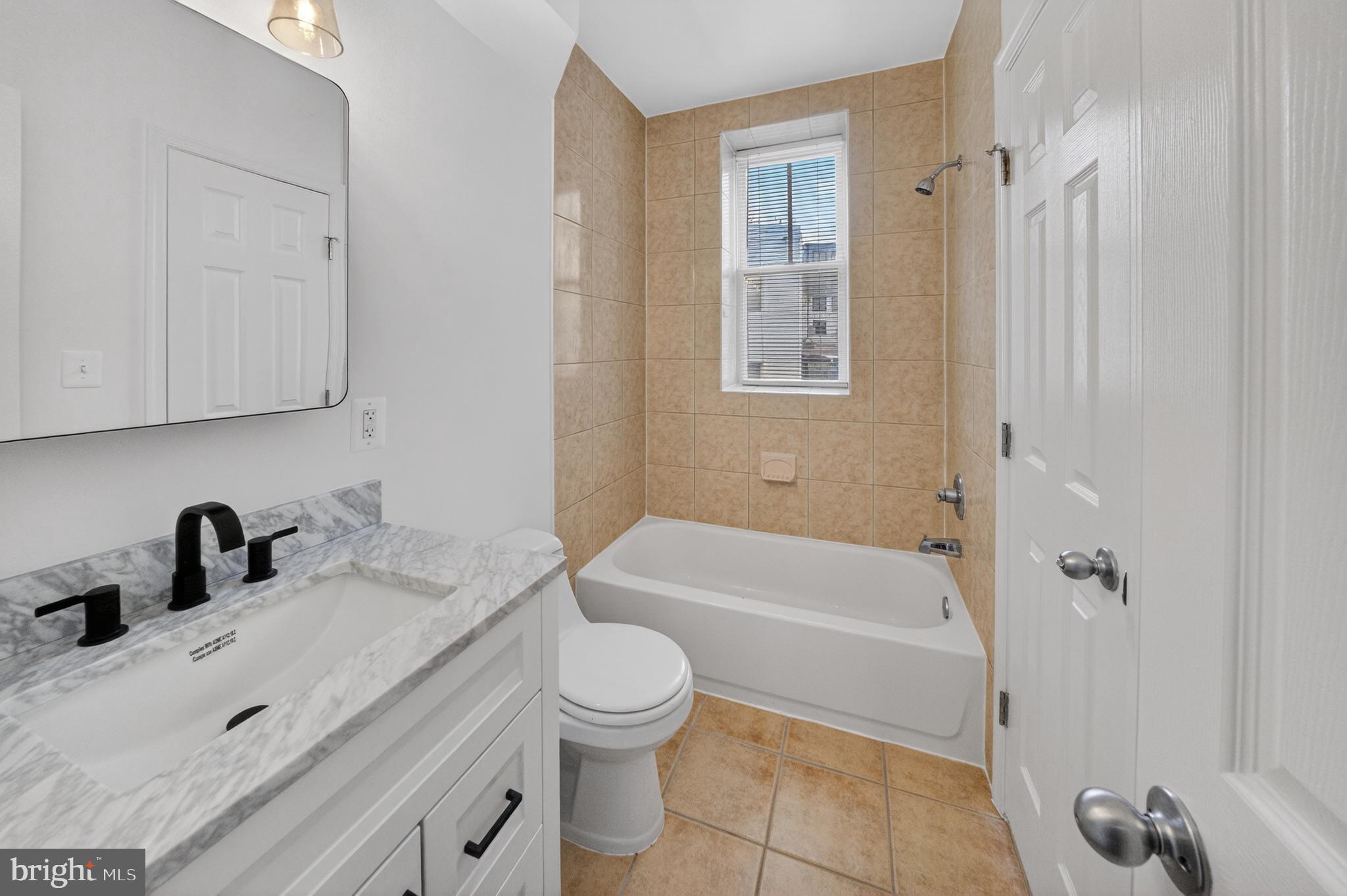 1629 L Street Northeast, Unit 202 Washington, DC 20002 - Photo 11 of 29 Updated bathroom