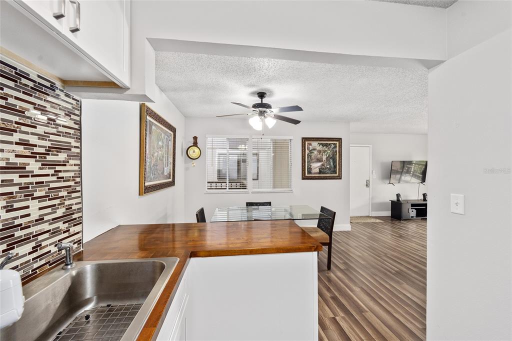 6519 West Newberry Road, Unit 1210 Gainesville, FL 32605 - Photo 11 of 16 a view of a living room and dining room