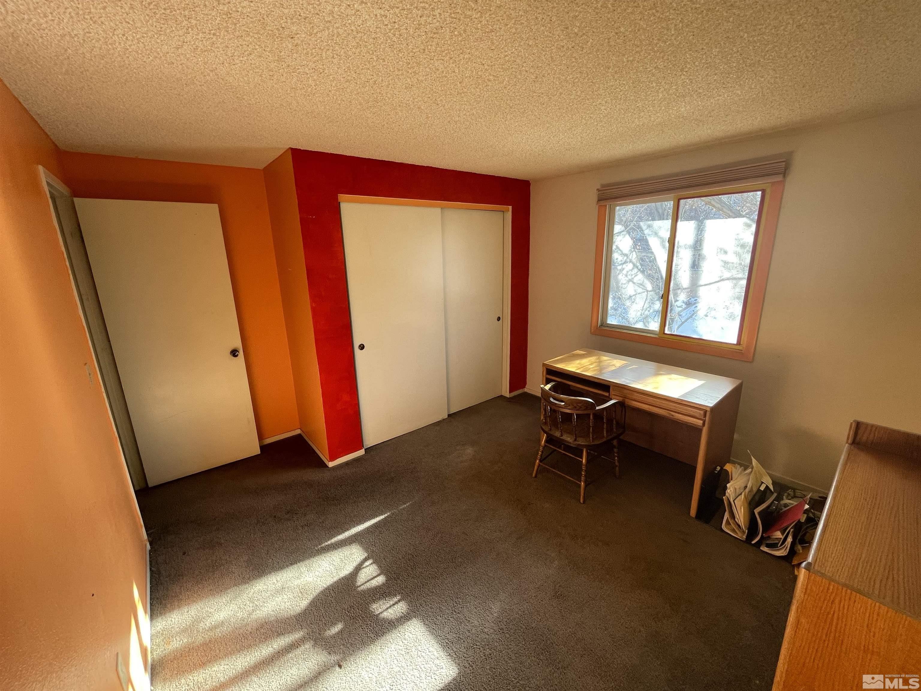 2606 Rayma Court Reno, NV 89503 - Photo 8 of 12 a living room with blue lights with furniture