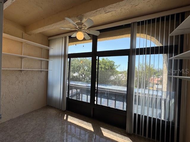 11485 Oakhurst Road, Unit 319 Largo, FL 33774 - Photo 14 of 63 a view of an empty room with a window