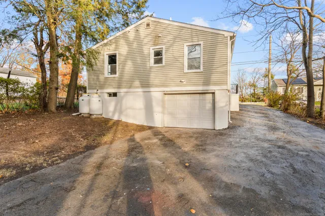 a view of a back yard of the house