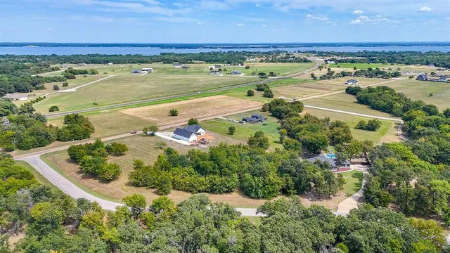 an aerial view of a houses with outdoor space