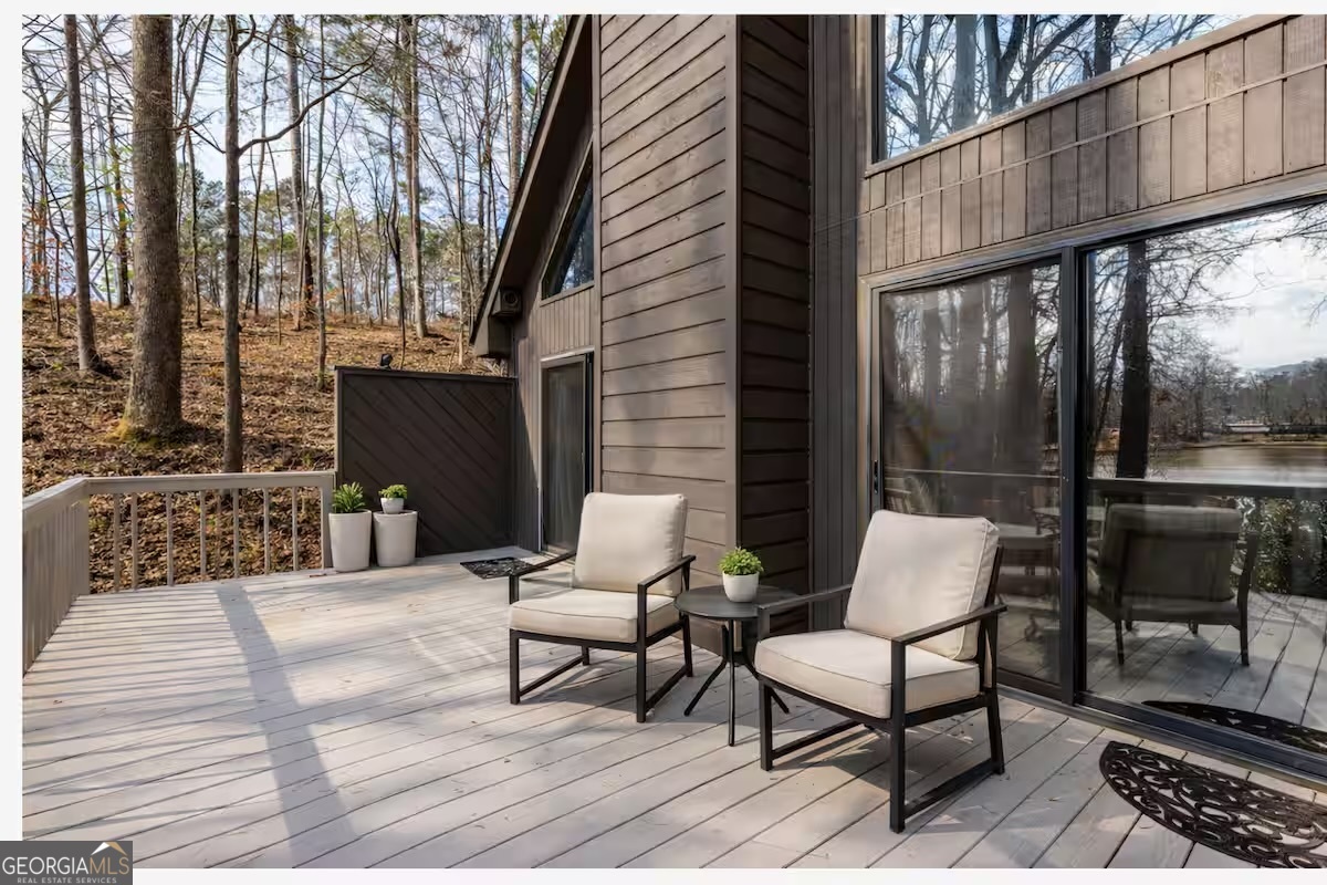 68 Franklin Road Eatonton, GA 31024 - Photo 5 of 28 a outdoor living space with patio furniture and a potted plant
