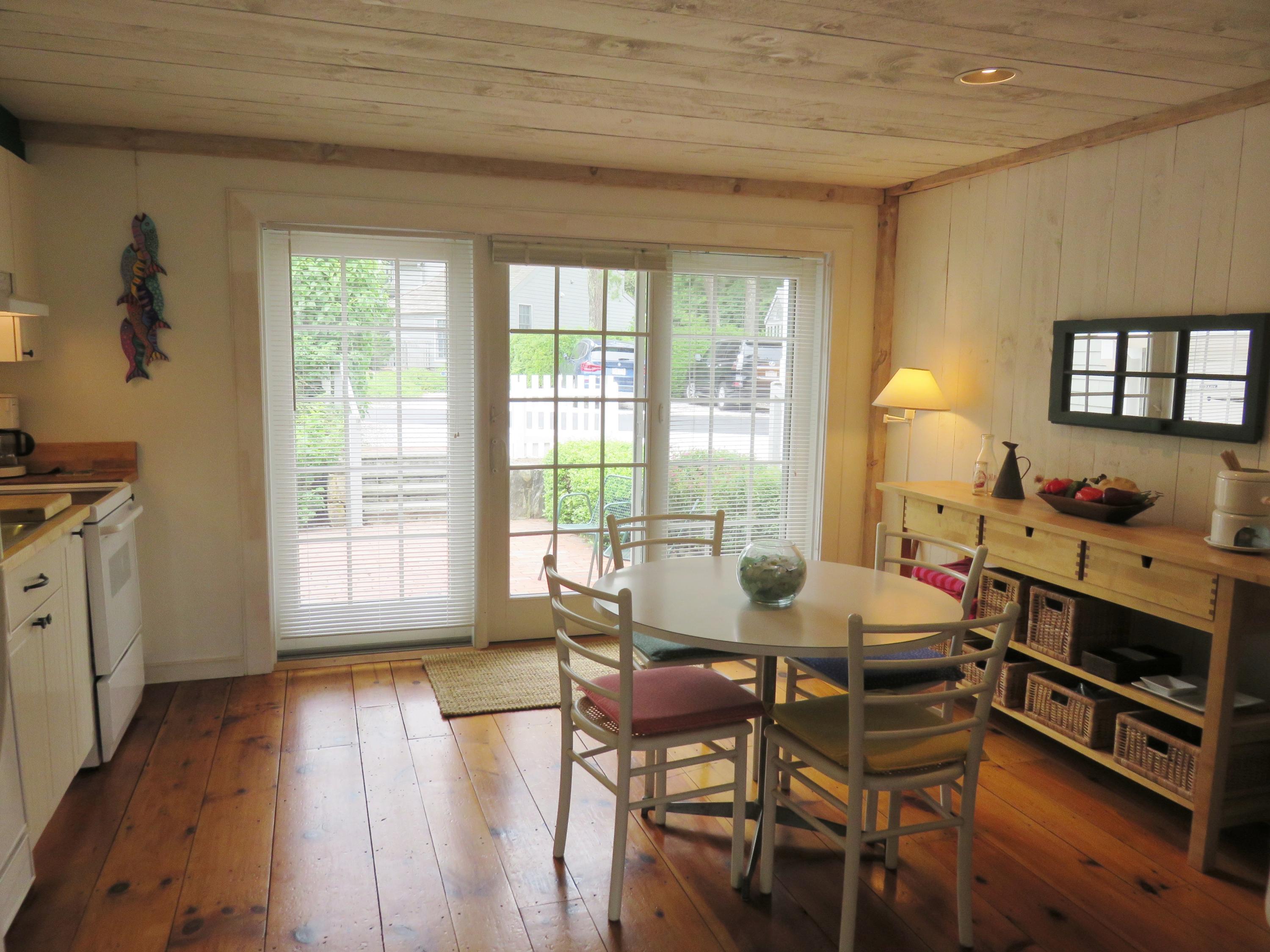 23 Brant Rock Road Mashpee, MA 02649 - Photo 11 of 34 a living room with furniture and a window